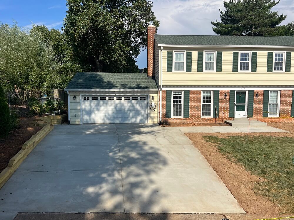 Concrete Driveway, Walkway and Wood Retaining Wall Project by Atlas General Contractors - McLean Virginia